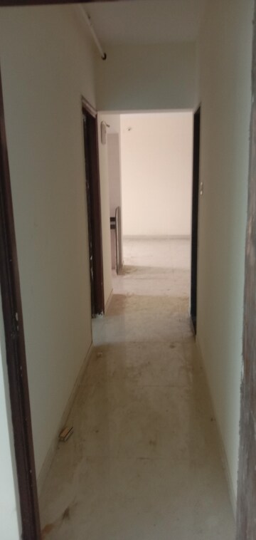 Building Lobby in 2 BHK Apartment at Uma Elements, Daighar Gaon – for Rent