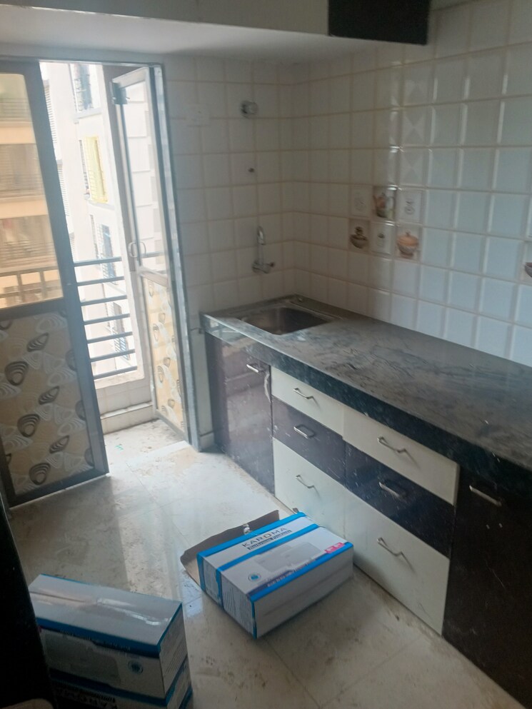 Kitchen, sterling-heights-vasai-east 1 Bedroom 650 Sq.Ft. Apartment In Vasai East Palghar 8897449
