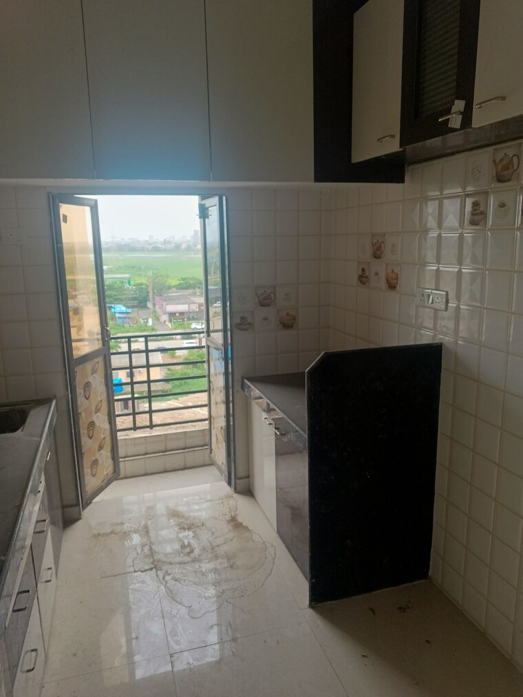 Kitchen, sterling-heights-vasai-east 1 Bedroom 650 Sq.Ft. Apartment In Vasai East Palghar 8897449