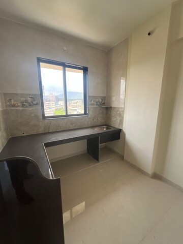 Kitchen in 2 BHK Apartment at Shree Sai Kulswamini, Shirgaon – for Sale