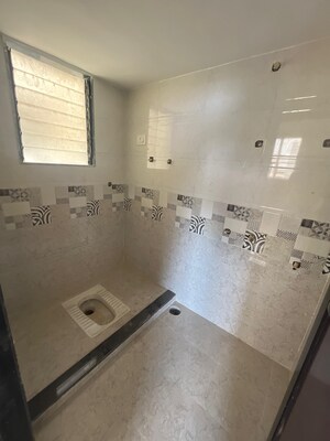 Bathroom in 2 BHK Apartment at Shree Sai Kulswamini, Shirgaon – for Sale