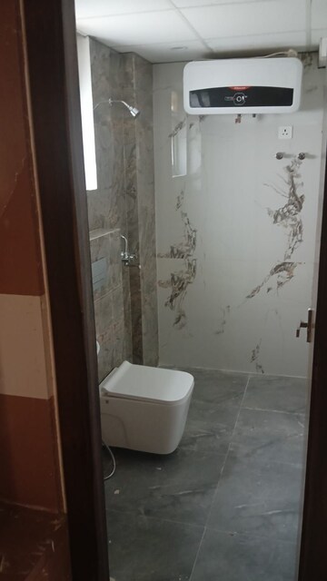 Bathroom in 3 BHK Apartment at Sushant Golf City – for Rent