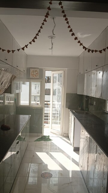 Kitchen in 3 BHK Apartment at Sushant Golf City – for Rent