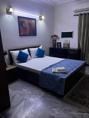 Bedroom in 4 BHK Apartment at Greater Kailash I – for Rent
