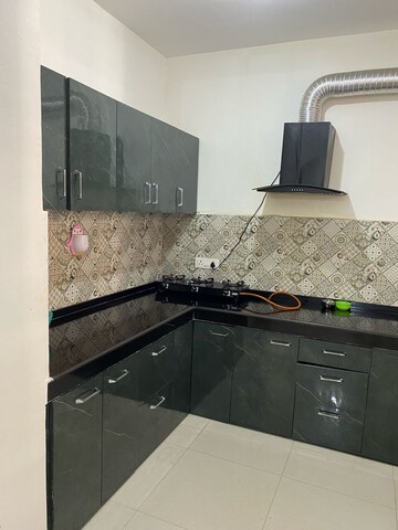 Kitchen in 2 BHK Independent House at Kiara Residency, Sushant Golf City – for Rent