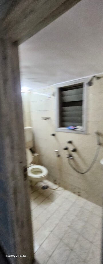 Bathroom in 2 BHK Apartment at Sunder Lane, Malad West – for Rent