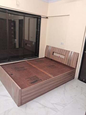 Bedroom in 1 BHK Apartment at Sheetal Tulsi Vihar CHS, Malad East – for Rent