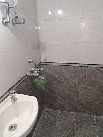 Bathroom in 1 BHK Apartment at Sheetal Tulsi Vihar CHS, Malad East – for Rent