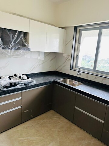 Kitchen in 2 BHK Apartment at Thapar Suburbia, Chembur – for Rent