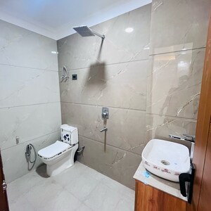 Bathroom in 3 BHK Builder Floor at Khirki Extension – for Sale