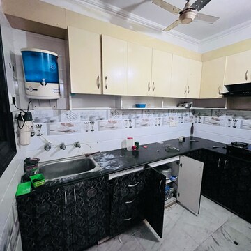 Kitchen in 2 BHK Builder Floor at Khirki Extension – for Rent