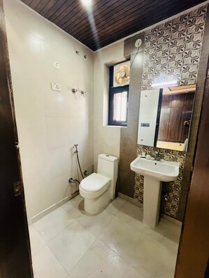 Bathroom in 4 BHK Builder Floor at Green Fields Colony – for Sale