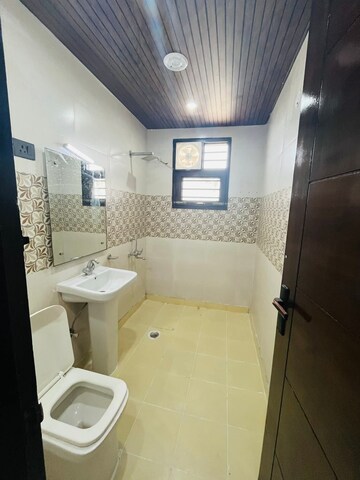 Bathroom in 4 BHK Builder Floor at Green Fields Colony – for Sale