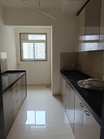 Kitchen in 3 BHK Apartment at Runwal Nirvana, Parel – for Rent