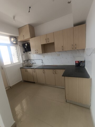 Kitchen in 2 BHK Apartment at Supertech Cape Town, Sector 74 – for Rent