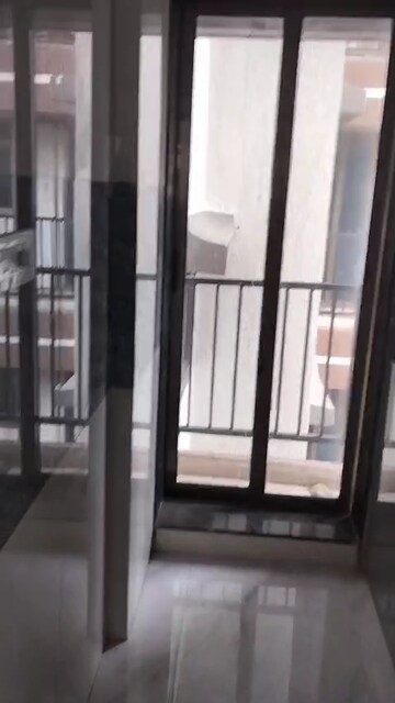 Building Lobby in 2 BHK Apartment at Vastu Complex, Andheri East – for Sale