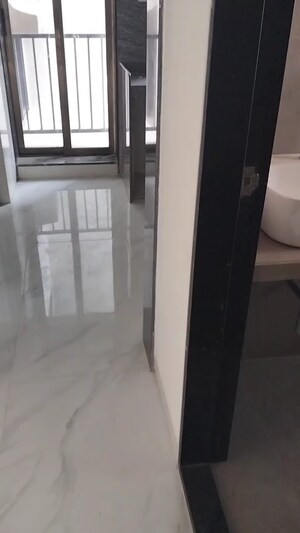 Building Lobby in 2 BHK Apartment at Vastu Complex, Andheri East – for Sale