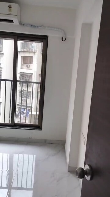 Building Lobby in 2 BHK Apartment at Vastu Complex, Andheri East – for Sale
