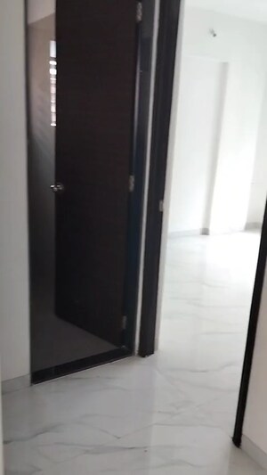 Building Lobby in 2 BHK Apartment at Vastu Complex, Andheri East – for Sale