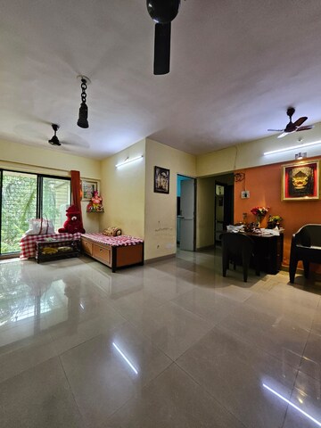 Living Room in 2 BHK Apartment at Parsik Nagar – for Sale
