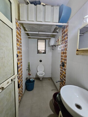 Bathroom in 2 BHK Apartment at Parsik Nagar – for Sale