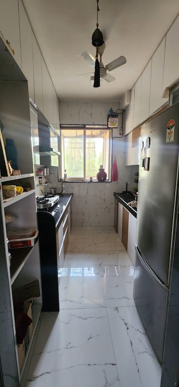 Kitchen in 3 BHK Apartment at Thakur Jewel Tower, Kandivali East – for Sale