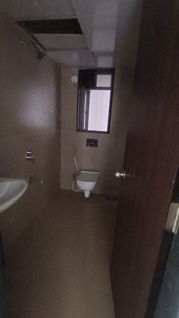 Bathroom in 2 BHK Apartment at Runwal Eirene, Balkum Pada – for Rent