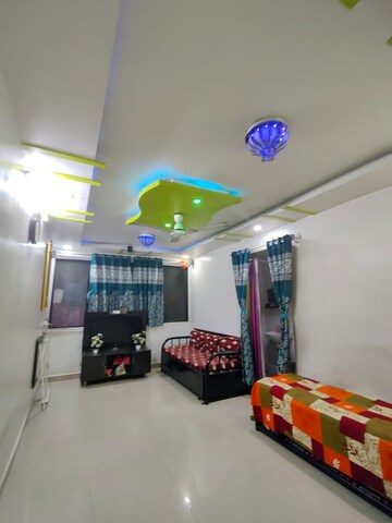 Living Room in 1 BHK Apartment at Wadgaon Sheri – for Sale