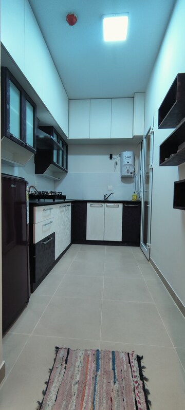 Kitchen in 2 BHK Apartment at Bhartiya Nikoo Homes, Thanisandra Main Road – for Rent