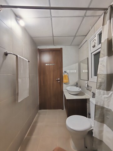 Bathroom in 2 BHK Apartment at Bhartiya Nikoo Homes, Thanisandra Main Road – for Rent