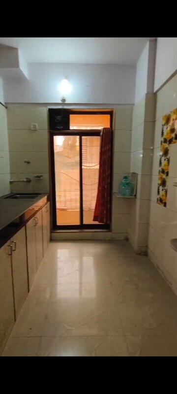 Kitchen in 2 BHK Apartment at Mira Road – for Sale