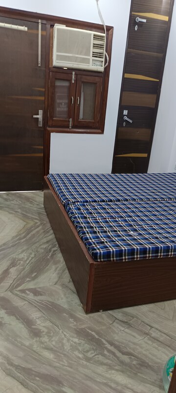 Bedroom in 2 BHK Builder Floor at Rohini Sector 11 – for Rent