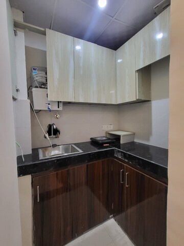 Kitchen in 1.5 BHK Builder Floor at Ansal Sushant Apartments, Sushant Lok I – for Rent