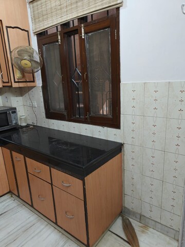 Kitchen in 4 BHK Apartment at Ansal Sushant Estate, Sector 52 – for Sale