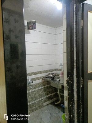 Bathroom in 2 BHK Apartment at Karve Nagar – for Sale