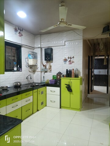 Kitchen in 2 BHK Apartment at Karve Nagar – for Sale