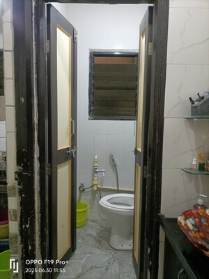 Bathroom in 2 BHK Apartment at Karve Nagar – for Sale