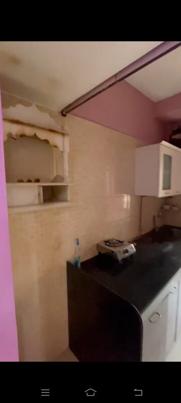 Kitchen in 1 BHK Apartment at Bhoomi Acres, Waghbil – for Rent