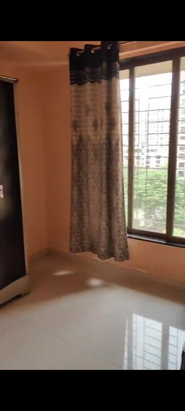 Bedroom in 1 RK Apartment at Bhoomi Acres, Waghbil – for Rent