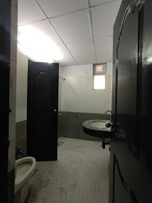 Bathroom in 4 BHK Apartment at Ramprastha Coral Heights, Ramprastha Greens – for Sale