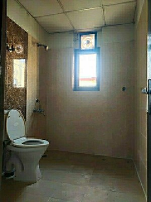 Bathroom in 4 BHK Apartment at Ramprastha Coral Heights, Ramprastha Greens – for Sale