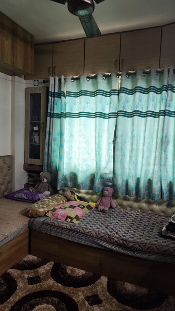 Bedroom in 2 BHK Apartment at Raviraj Yellow Blossoms, Ghorpadi – for Rent