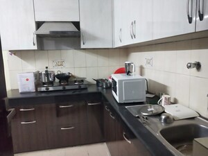 Kitchen in 2 BHK Apartment at Unitech The Residences Gurgaon, Sector 33 – for Sale