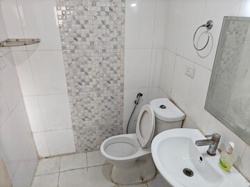 Bathroom in 3 BHK Apartment at Prateek Wisteria, Sector 77 – for Rent