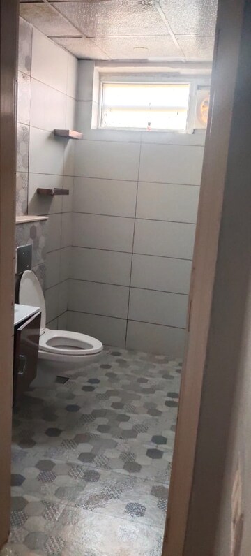 Bathroom in 3 BHK Apartment at Shiv Shankar Society, Sector 51 – for Sale