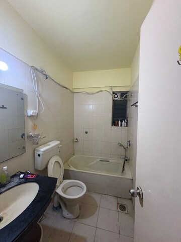 Bathroom in 2 BHK Apartment at Sonigara Omega Paradise, Wakad – for Rent