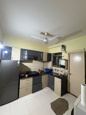 Kitchen in 2 BHK Apartment at Sonigara Omega Paradise, Wakad – for Rent