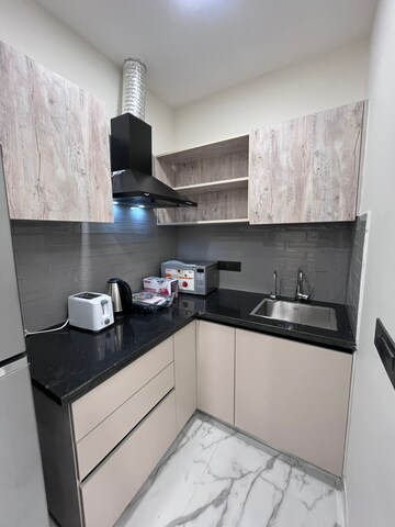 Kitchen in 1.5 BHK Builder Floor at Experion One 42, Sector 42 – for Rent