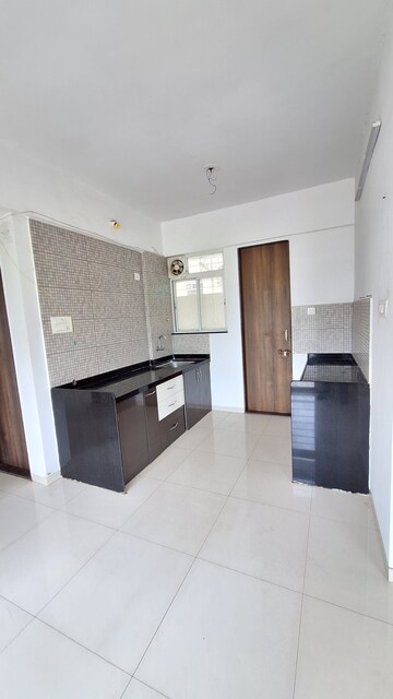 Kitchen in 2 BHK Apartment at Dodke Shobhan, Warje – for Sale