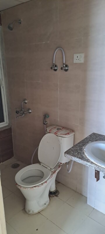 Bathroom in 2 BHK Apartment at Sector 10 Greater Noida – for Rent